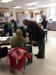 Representative Steve Tharinger asking students questions about the lab.